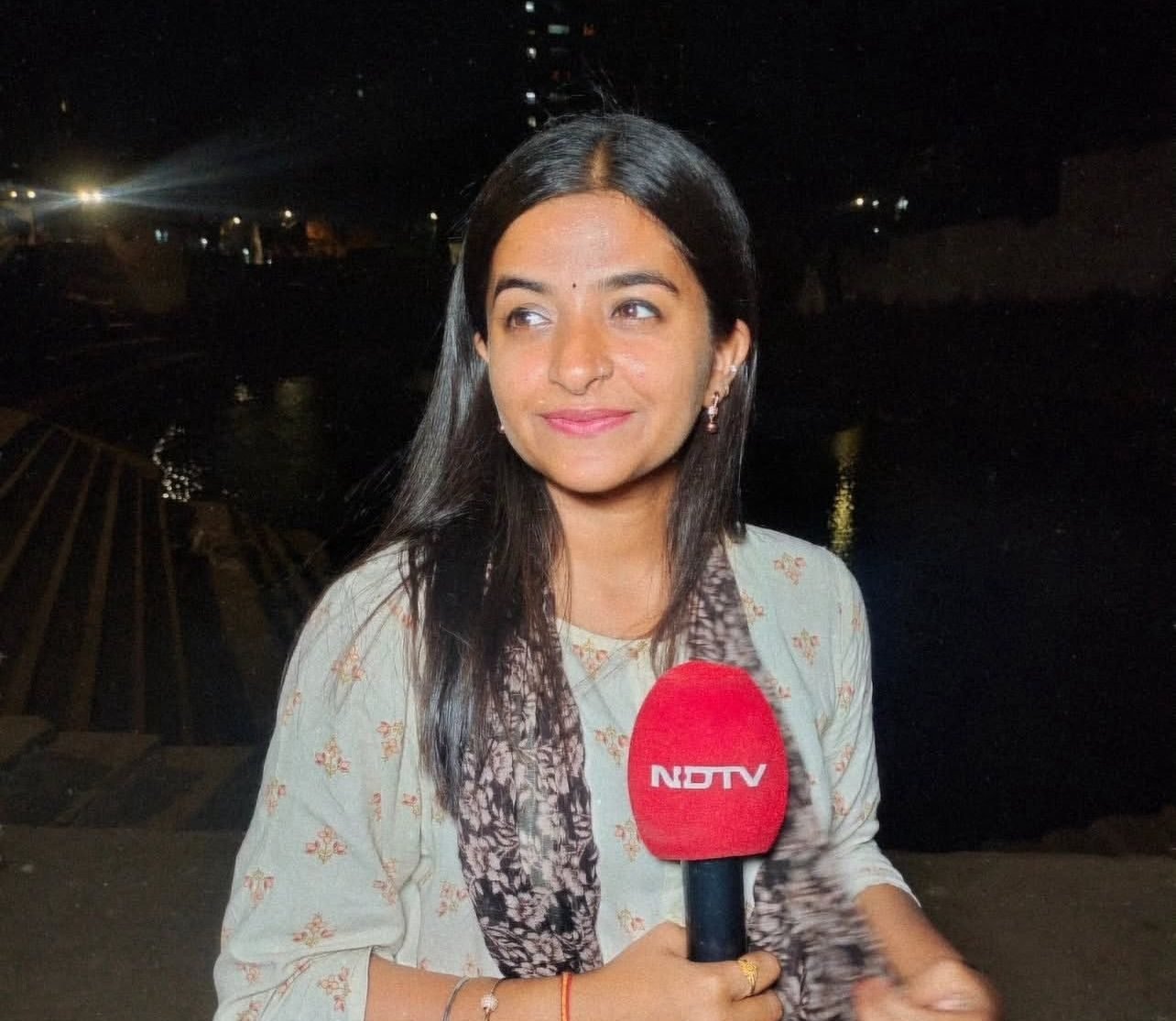 Sujata Dwivedi reporting on location for NDTV